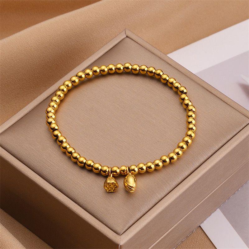 

Браслет из титановой стали в стиле TikTok с гладким лотосовым стручком и бусиной в форме сердца - Не тускнеющий и гипоаллергенный