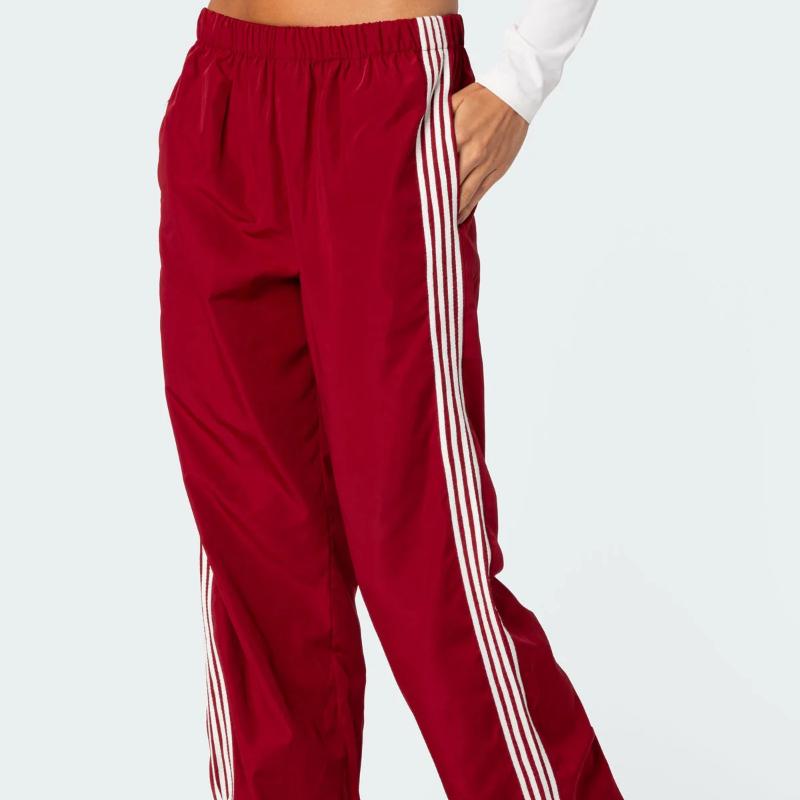 2025 günlük moda çok yönlü spor tarzı dört şeritli kontrastlı düz paça pantolon ilkbahar ve yaz için