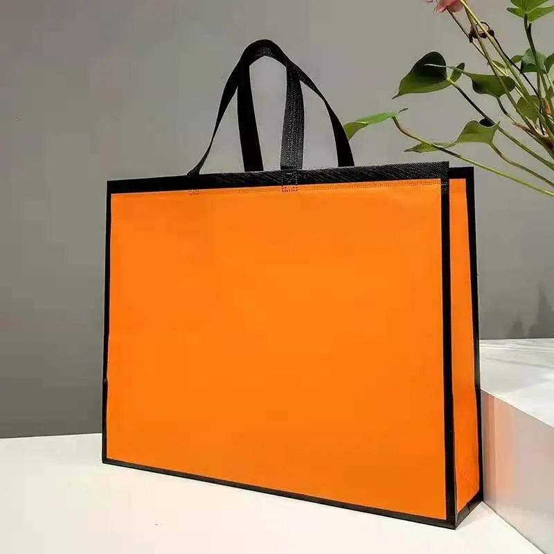 10PCS Rose Printing Packaging Shopping Bag Handle Waterproof Non Woven Fabric Gift Bags Black Clothing Store HandBag