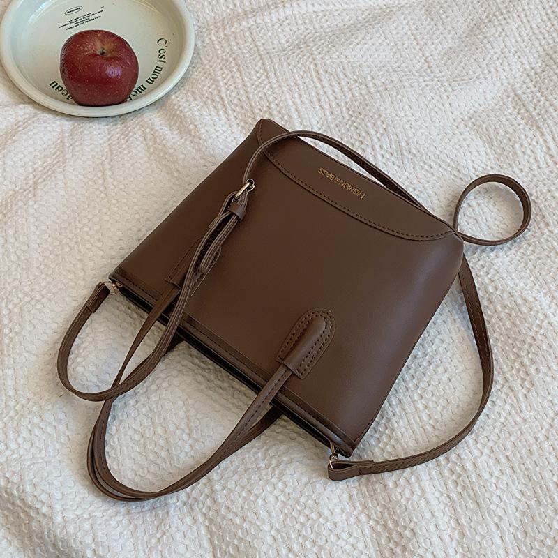 

Premium retro portable bucket bag women s bag 2025 new fashion shoulder bag messenger bag темно-коричневого