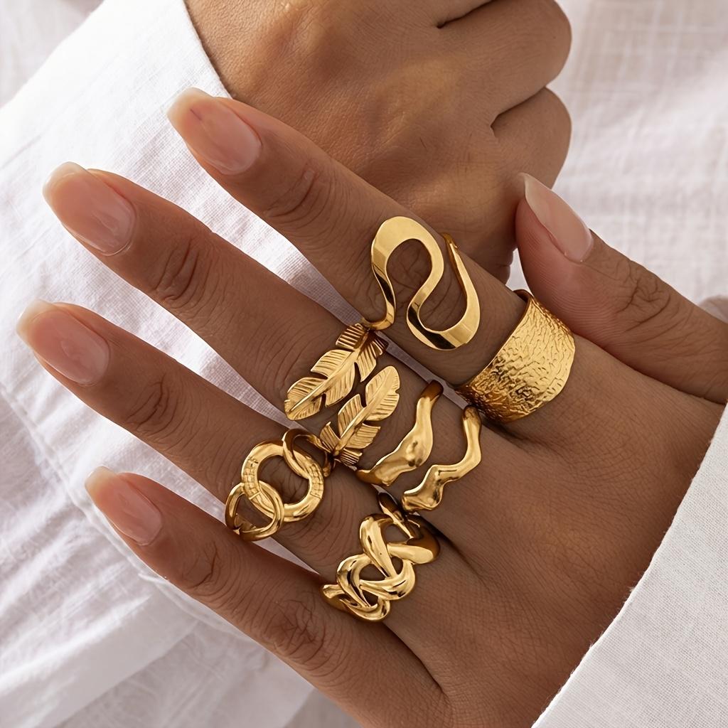 Fashionable stainless steel ring with a simple hollow geometric design, suitable for stacking, a versatile choice for casual wear