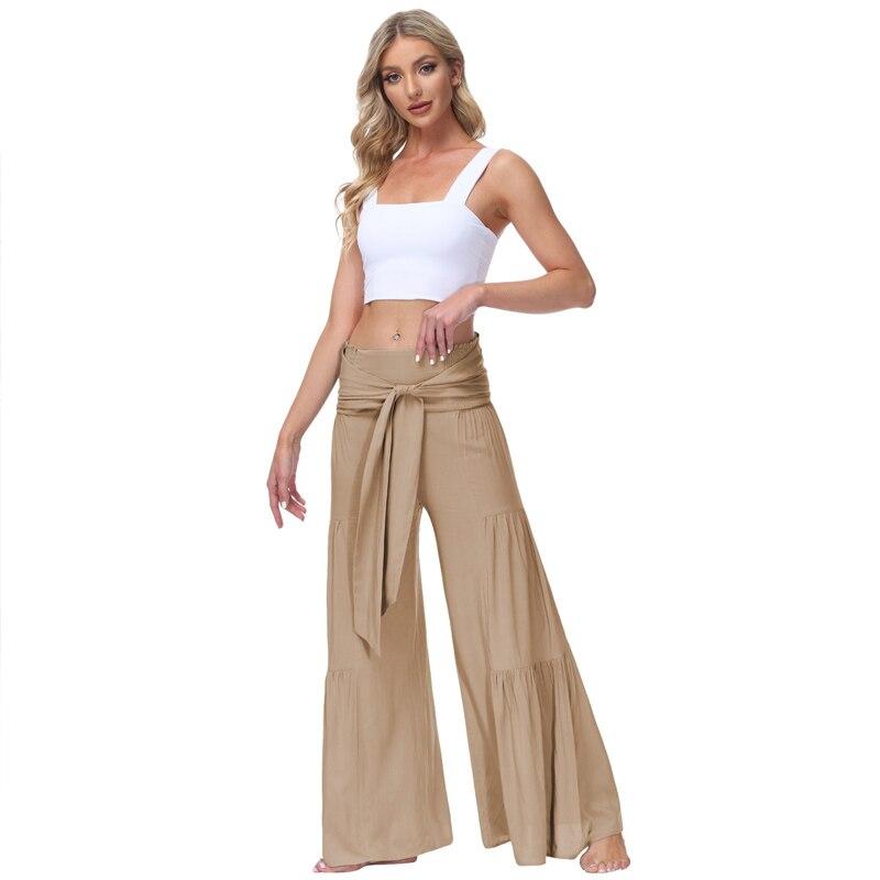 

Модні довгі жіночі плісировані штани з еластичною еластичною талією, елегантні однотонні мішкуваті широкі брюки, повсякденні бретелі Pantaloni Donna 25921 XL ультра колір