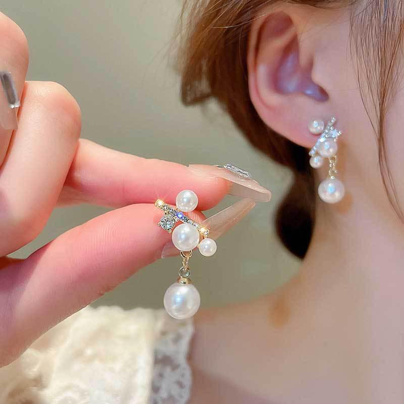 Koreanischer Stil Nicht-Piercing Ohrclip mit langem Quaste, Perlmutt Schmetterlings Design für Damen - High-End, Coole Mode.
