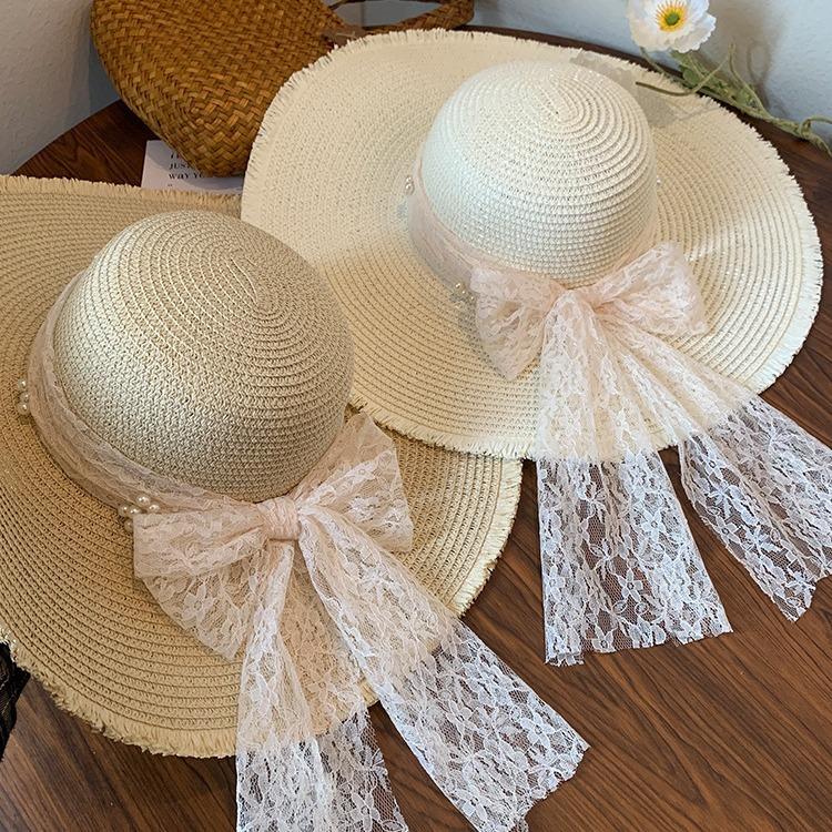 Internet celebrity sweet woven straw hat women's summer French seaside vacation sun hat big brim shading sun protection hat