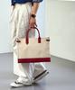 Matt Slim Canvas Leather Square Bag (Ivory + Red) B42915