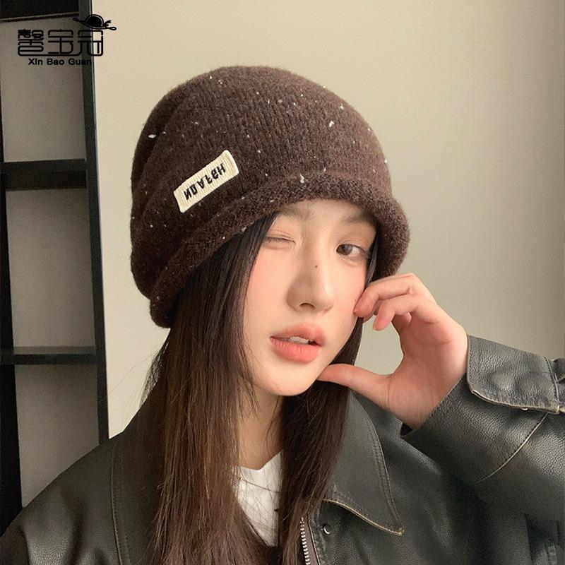 Curled head hat women's autumn and winter outdoor warm ear protection knitted wool hat showing face small versatile pile hat