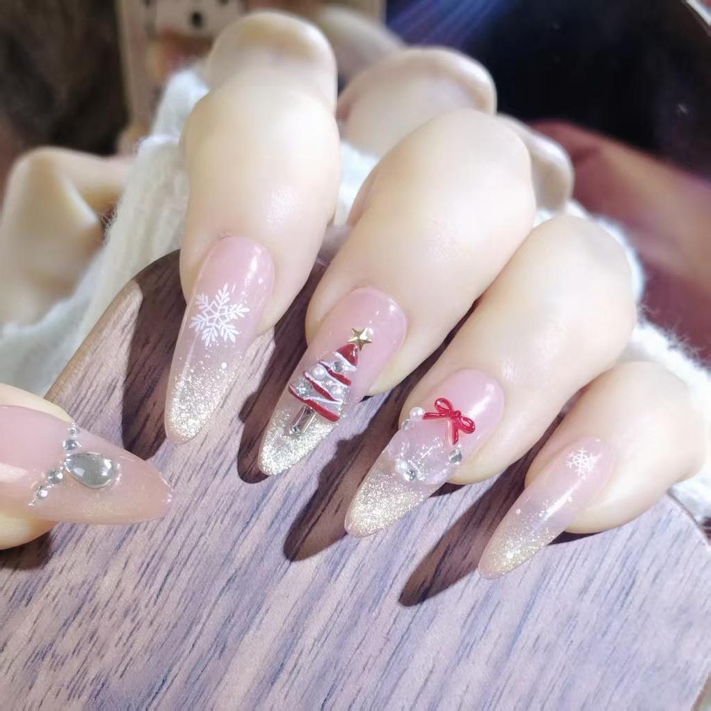Elegant Handmade Long Cat Eye Christmas Nails with Snowflakes and Rhinestones