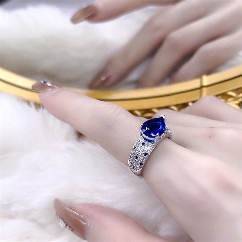 Elegant Adjustable Sapphire-Colored Gemstone Ring for Women with Micro-Paved Zircon Diamonds - Versatile and Stylish Gift.