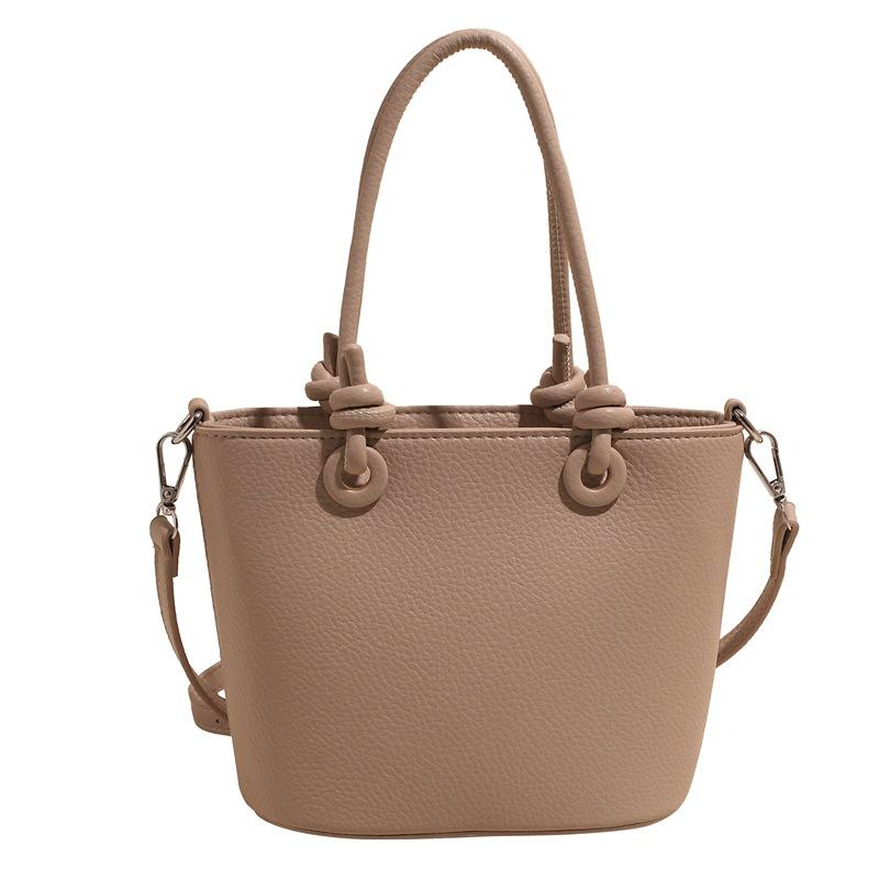 Wholesale hot sale high quality casual lychee pattern solid color portable bucket bag versatile simple wind commuter messenger bag women