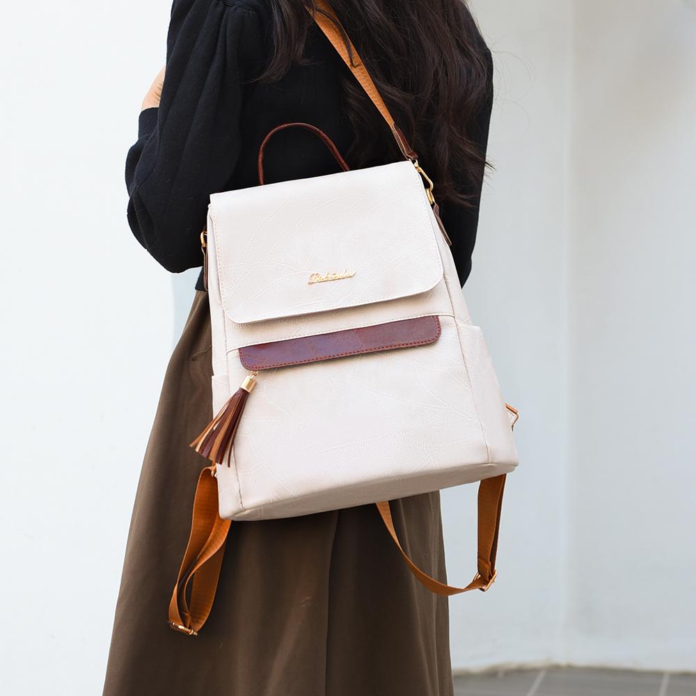 Женский многофункциональный рюкзак из мягкой кожи с кисточками в стиле ретро — фото 6