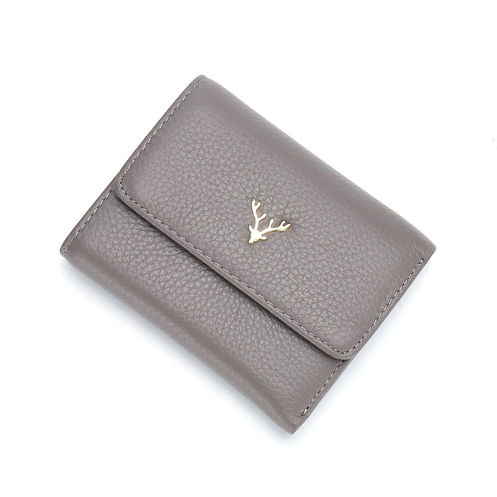 Mode kurzes Portemonnaie Japanische Frauen 30% Rabatt, erste Schicht Rindsleder schlichtes kleines Portemonnaie gefaltet dünn neues Modell