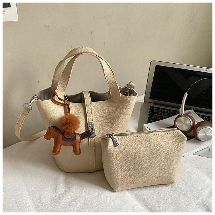 Fashion vegetable basket bucket bag women's 2025 autumn new high-value shoulder bag simple solid color niche messenger bag