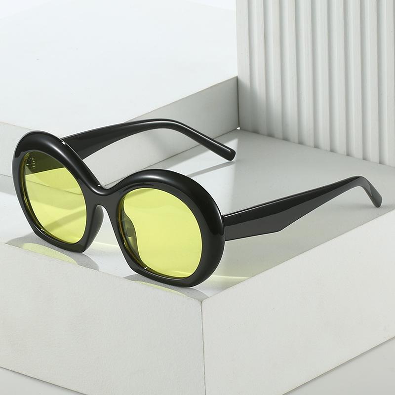 New oval sunglasses, European and American personalized arc inflatable glasses, street puff sunglasses for women