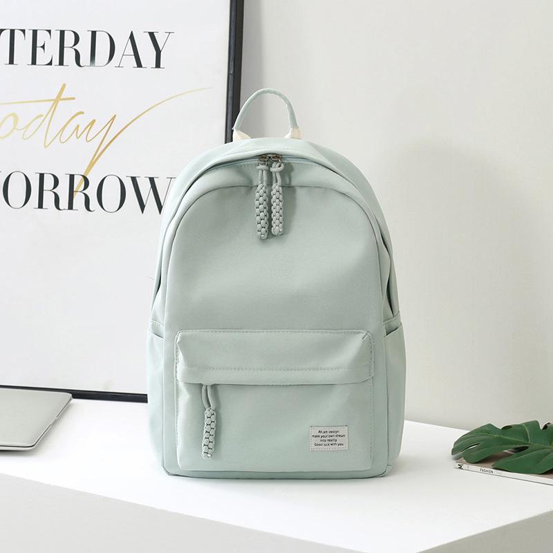 Solid color class schoolbag female college student junior high school student high school student backpack new simple travel backpack customization