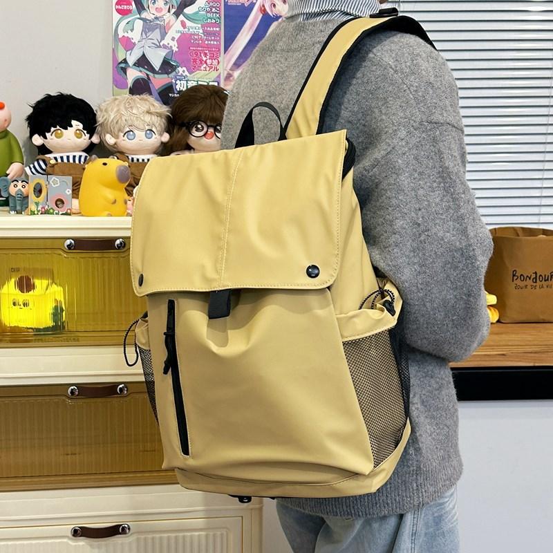 Schoolbag backpack women's new large-capacity solid color simple leisure college wind backpack trend flip student class schoolbag