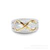 Dual-Tone Infinity Ring with Shimmering Diamonds: Gold & Silver Symbol of Eternity