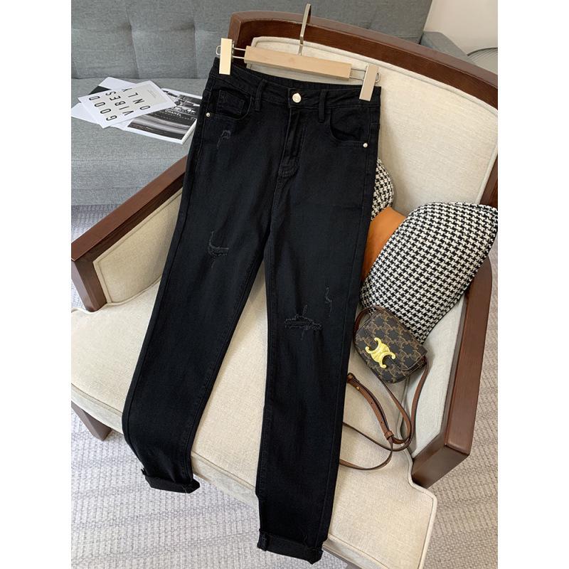 

Жіночі джинси слім з високою посадкою та рваним ефектом - Еластичні, дев ятиточкові, облягаючі для весни Small