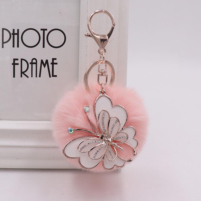 Exquisite Butterfly Plush Fur Ball Keychain for Bags, Cars, and Luggage.