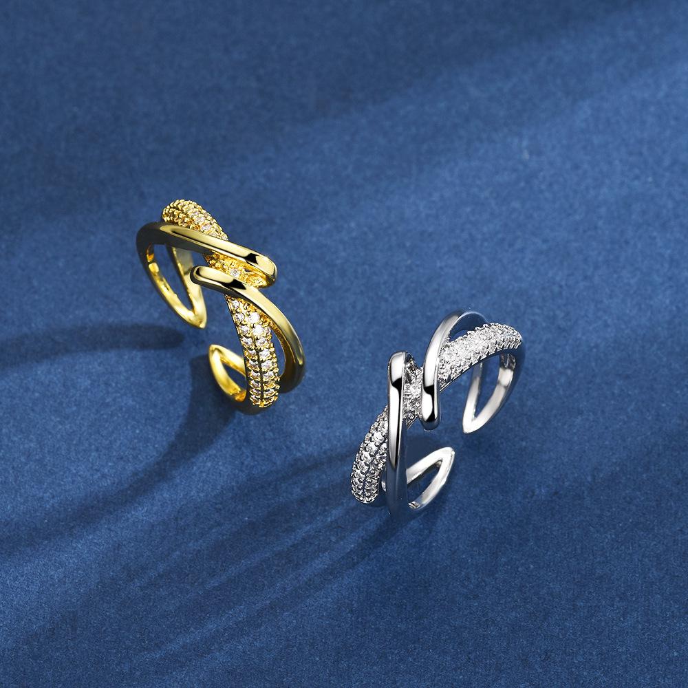 Geometric Criss-Cross Wrap Ring: Women's Elegant Cold-Style Design.