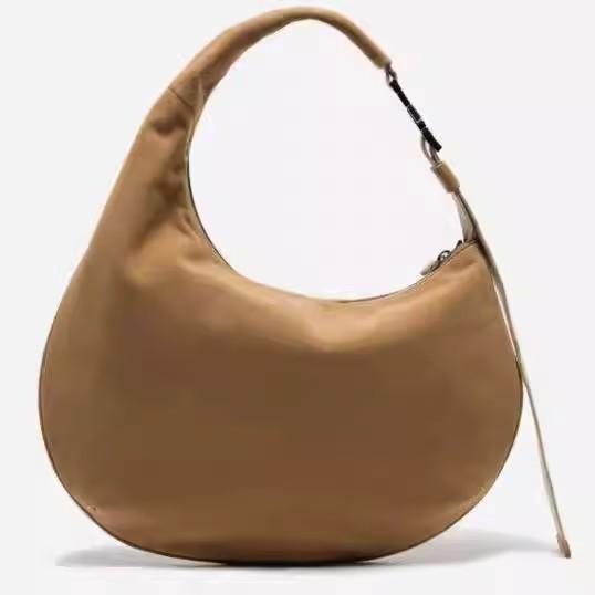 

Винтажная замшевая сумка-пельмень на одно плечо женская 2025 новая большой вместимости портативная сумка для йоги сумка-подмышка для поездок коричневый