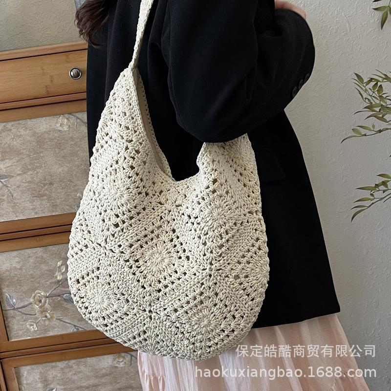Hollow ins vacation shoulder bag retro straw bag women's 2025 summer new Mori braided shoulder tote bag