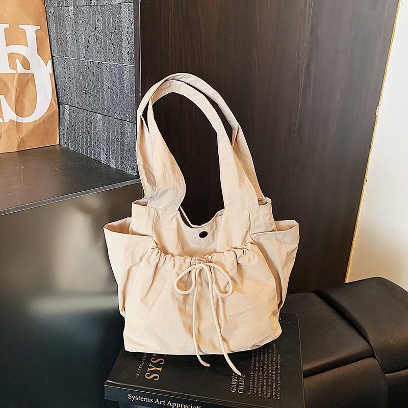 Korean Versi Fashi Nyl Shoulder Tote Bag Women s 2026 New Simple and Lightweight Handbag Casual Drawstring Armpit Bag хаки