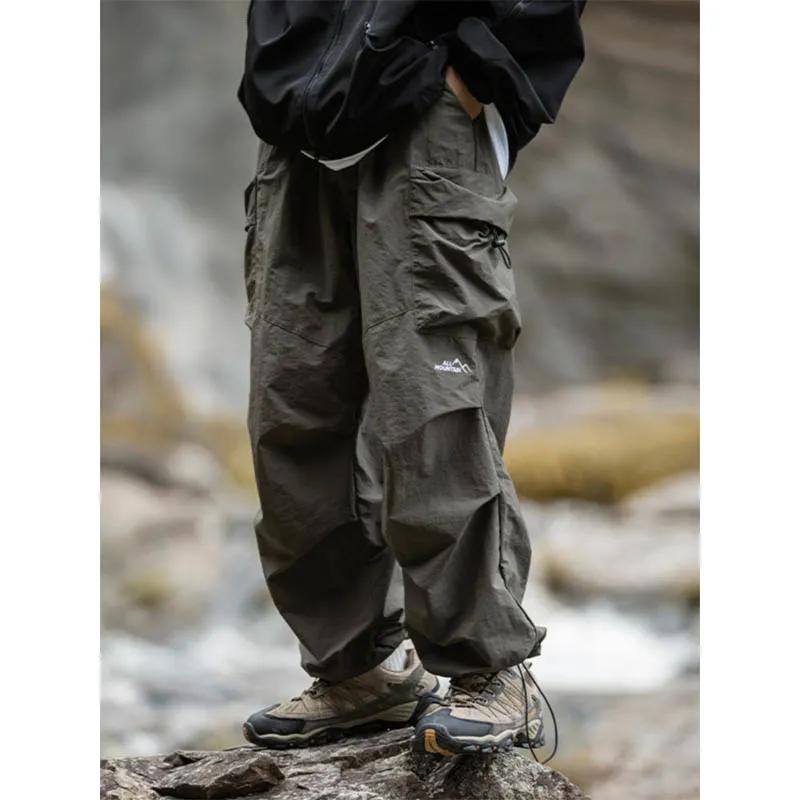Men's Spring Mountaineering Waterproof Rushing Pants Youth Handsome Loose Sports Work Pants
