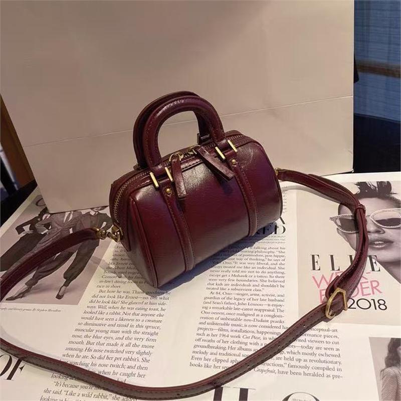 

Премиум ретро мягкая кожаная сумка-подушка женская 2025 новый универсальный нишевый легкий люкс цилиндрическая сумка портативная сумка-мессенджер красный