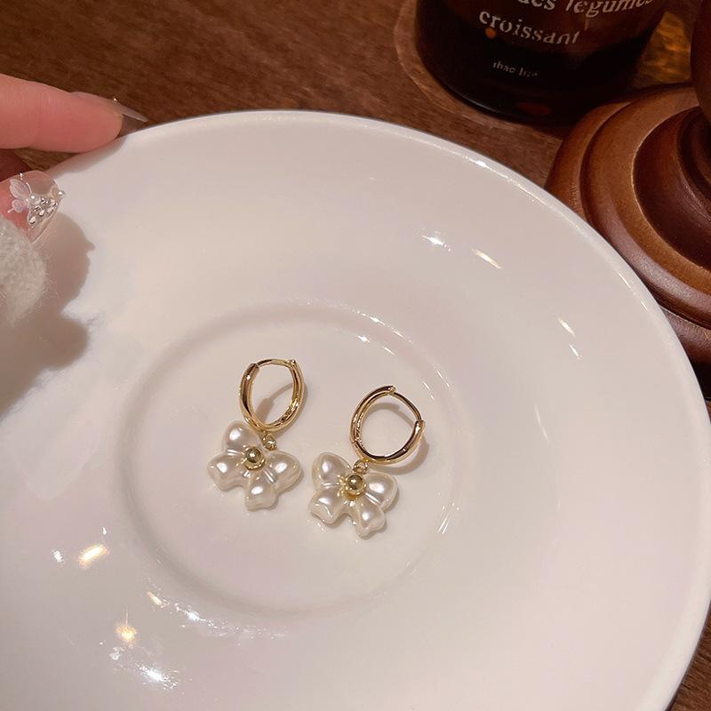 

Супер бессмертный темперамент передовые ощущения длинные кисточки искусственный жемчуг бабочка серьги пряжки для женщин 1 pair