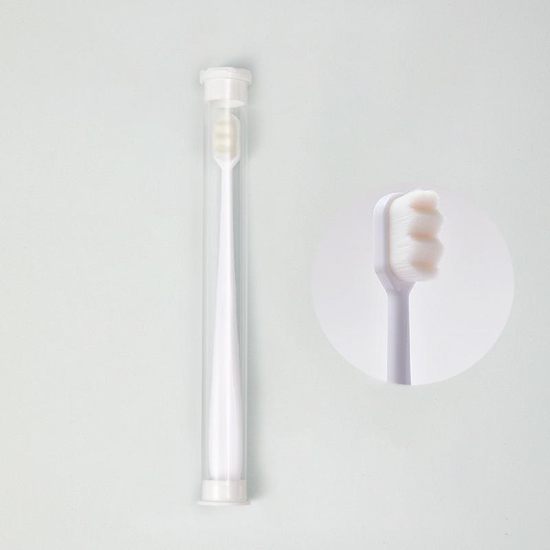 

Japanese Ultra-Fine Soft Bristle Toothbrush with Protective Cylinder Packaging - Versatile Use.