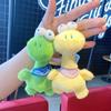 Adorable Big-Eyed Dinosaur Plush Pendant - Cute Bag Charm and Claw Machine Doll
