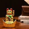 Decorative Showpiece –Feng Shui Cat Sitting On Money Ingots |Golden Waving Hand Cat |Symbol of Good Luck, Wealth, Health & Happiness