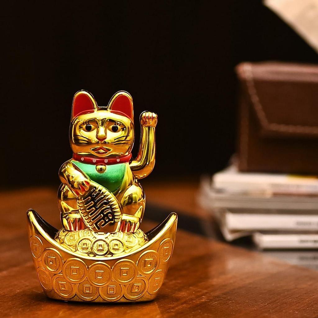 Decorative Showpiece –Feng Shui Cat Sitting On Money Ingots |Golden Waving Hand Cat |Symbol of Good Luck, Wealth, Health & Happiness