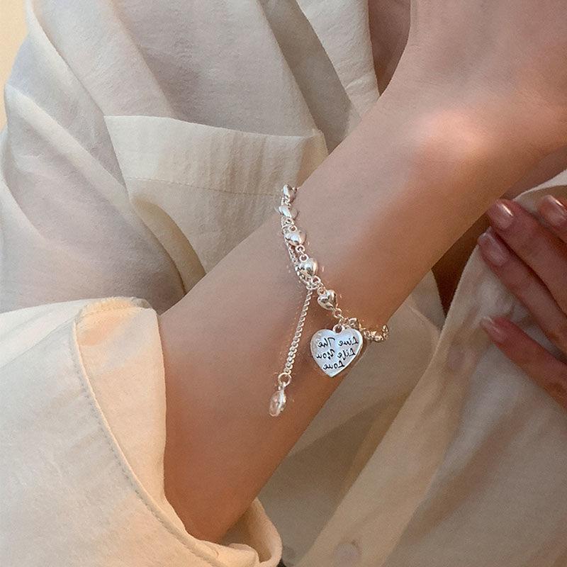 Light luxury niche sterling silver heart bracelet with bell pendant2026New best friend jewelry, a gift for girls