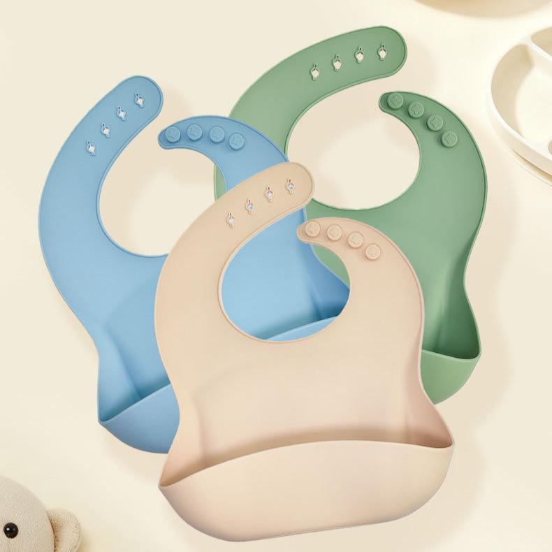 Bavaglino Impermeabile in Silicone per Bambini - Resistente alle Macchie, Tasca Raccogli Cibo Inclusa, Personalizzabile con LOGO.