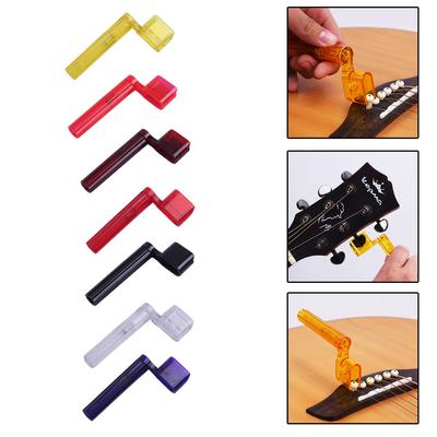 Gitar Sarıcı ve Köprü Pimi Çıkarıcımız ile Tel Değişimlerini Kolaylaştırın Şimdi Alışveriş Yapın