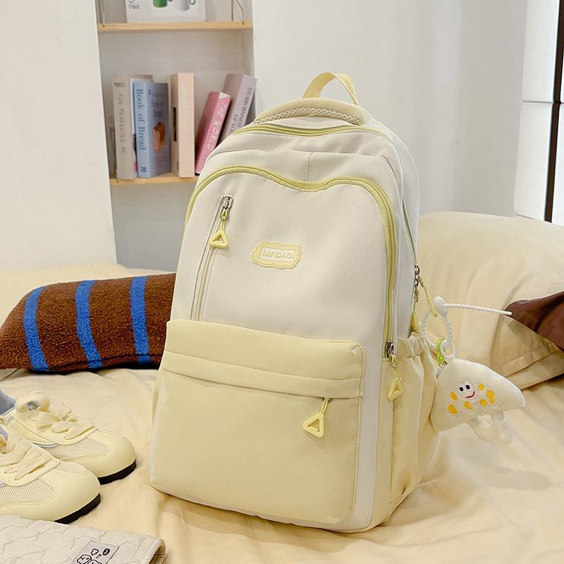 2025 summer new large-capacity literary and versatile high-value schoolbag female junior high school students simple and lightweight backpack