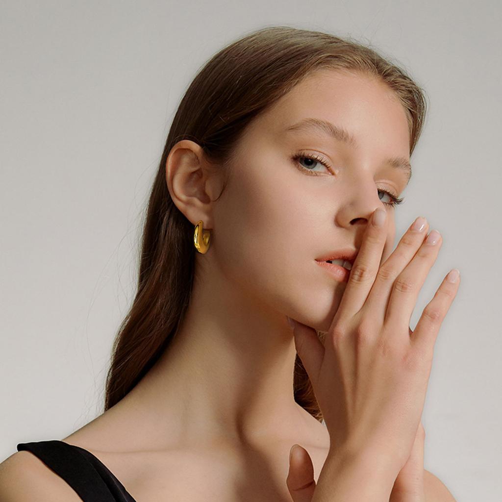 Stainless steel women's earrings, high-end sense C-shaped simple meniscus geometric earrings, exaggerated hollow gold jewelry