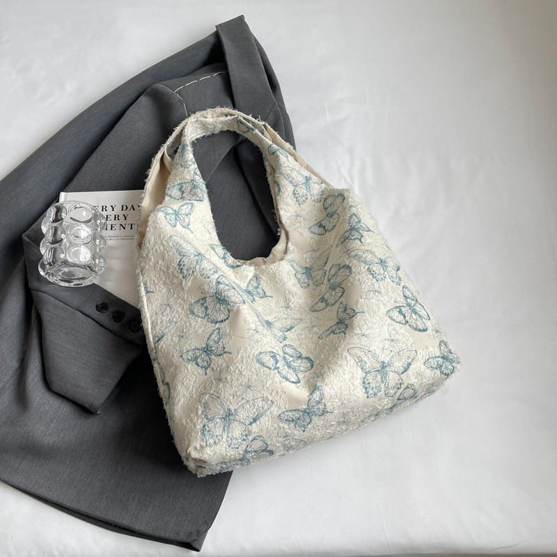 

Elegant And Chic Women s Canvas Tote Bag With Spacious Design And Unique Style синій