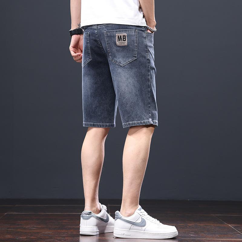 Pantaloncini di jeans da uomo, estivi sottili larghi dritti casual alla moda marca strappati cinque o sei divisione del lavoro pantaloni da uomo