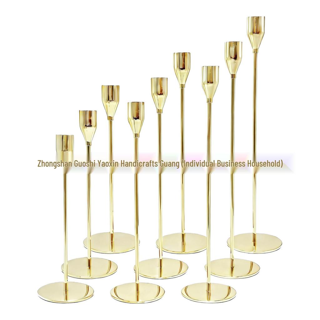 Elegant European Candle Holder Set: Electroplated Three-Piece Metal Ornament for High-End Dining and Wedding Décor.