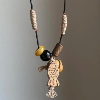 Ethnic Wooden Bead Fish Pendant Necklace: Versatile Chinese Sweater Chain for Women