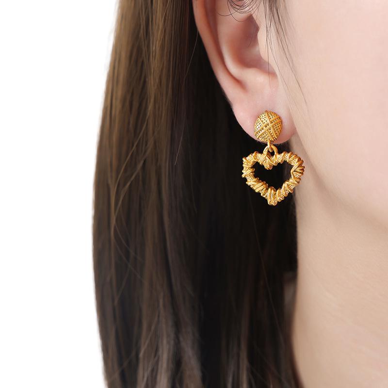 Heart-Shaped Peach Gold Retro Titanium Steel Earrings with Spiral Design
