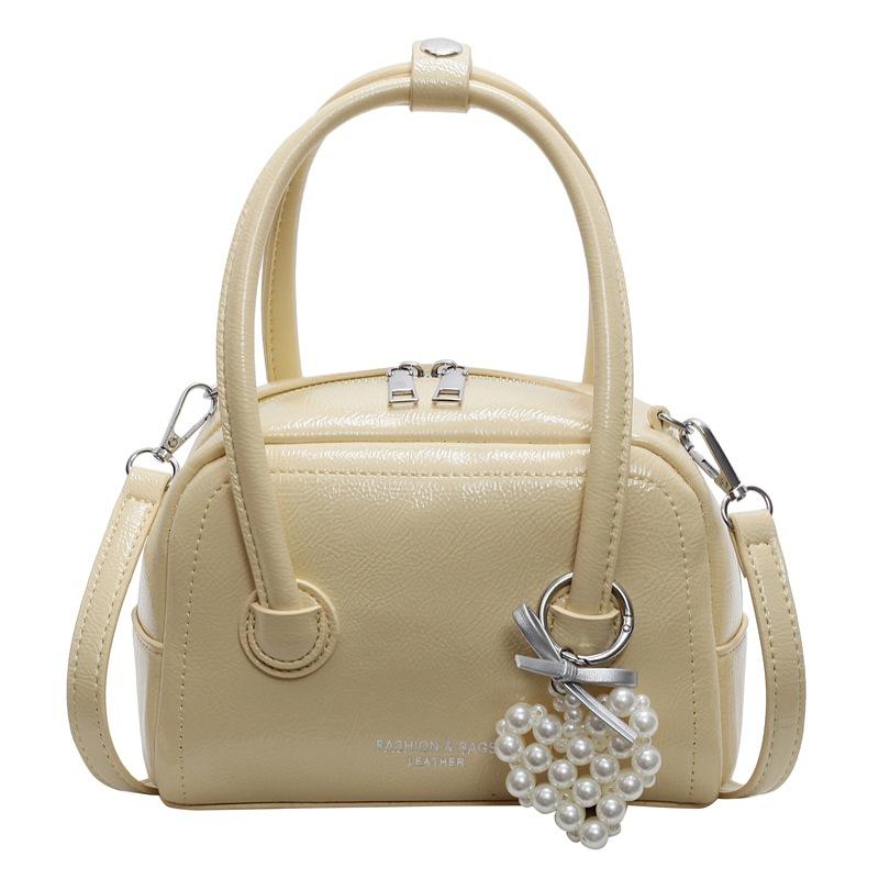 Summer new fashion simple style Korean version sweet portable pillow bag high sense versatile commuter messenger women's bag