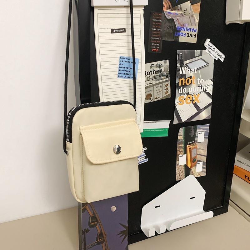 

Niche light shopping nylon cloth mobile phone bag small square bag crossbody small bag men s bag Korean version Oxford cloth small satchel women s bag