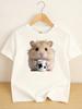 T-shirt Rosa Chiaro a Maniche Corte per Bambini Criceto Carino e Soffice che Tiene una Tazza da Latte a Pois Mucca Grafica Realistica di Animale Domestico Casuale Ragazzi Ragazze Quotidiano A