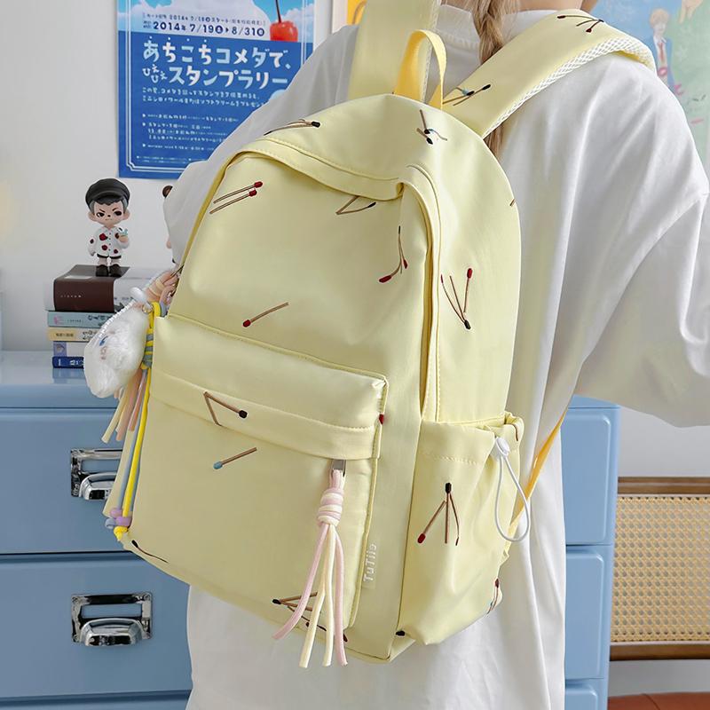 Matchstick Print Backpack for Women and Girls Fashion School Travel Daypack with Tassel Detail