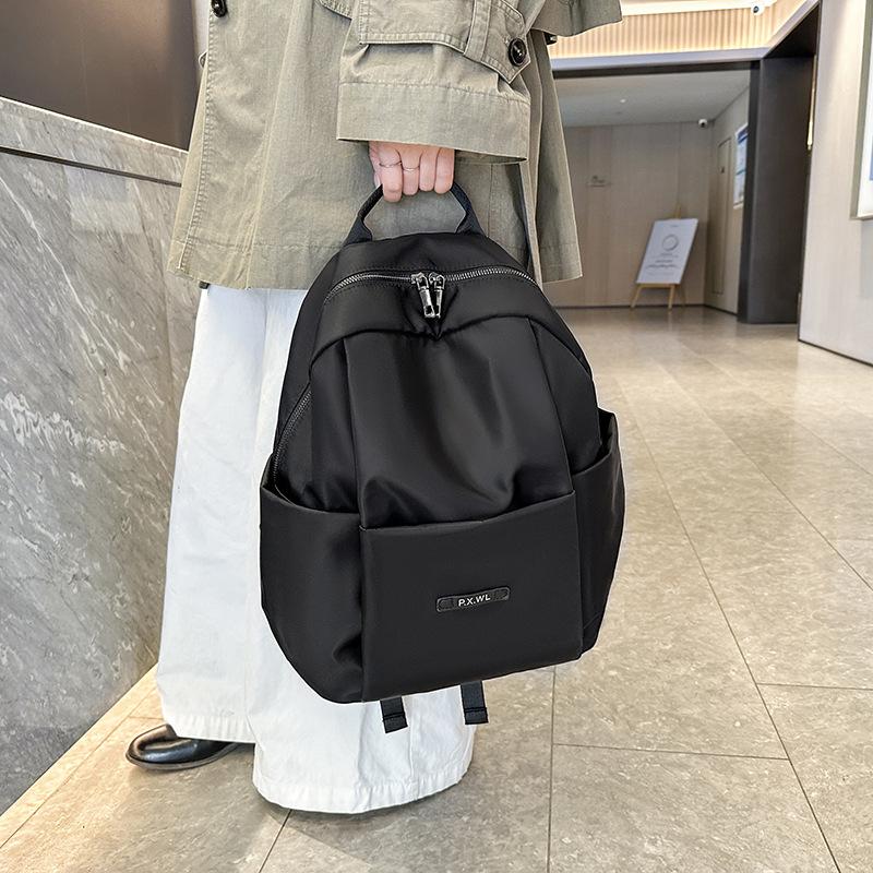 Schoolbag1011 New Simple Design Backpack Large Capacity Junior High School School Bag Commuter Lightweight Waterproof Travel Backpack