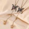 Elegantes Schmetterlings-Anhänger-Langhalskette für Damen im stilvollen koreanischen Design mit Edelsteinakzenten