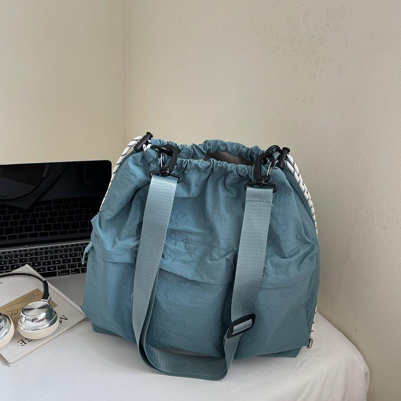 

Niche design casual personality shoulder messenger bag 2025 autumn new large-capacity bag women s bucket bag синий